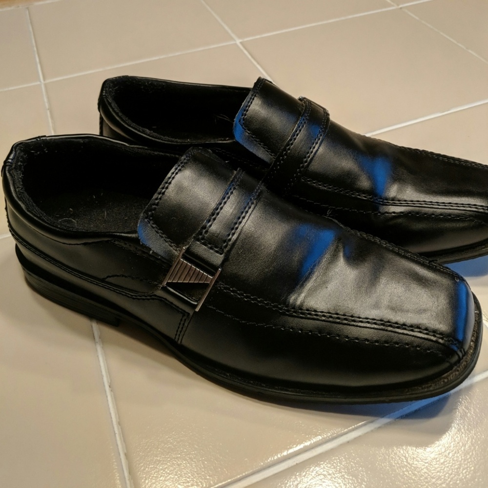 Young men's black slip on dress shoes